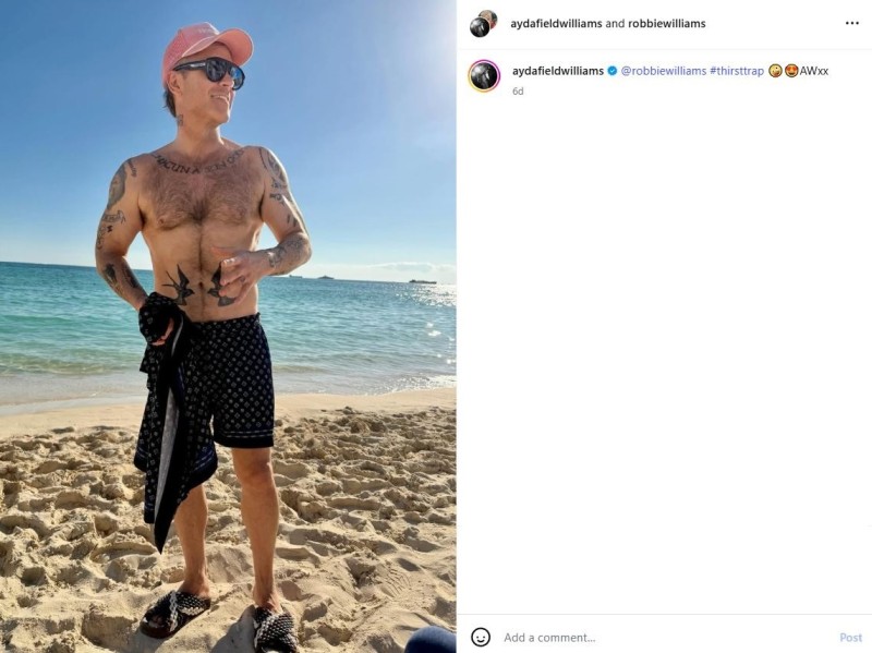 Robbie Williams, la foto “thirst trap” e l’economia del corpo: dimagrire, mostrarsi, monetizzare